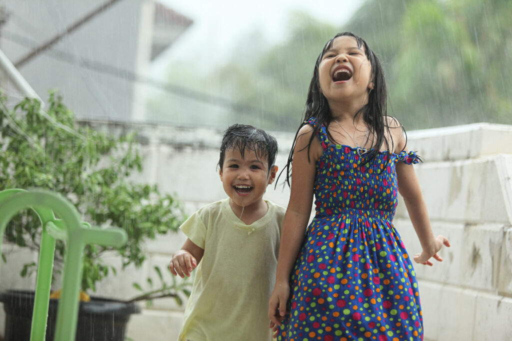 Siblings,Playing,With,The,Rain