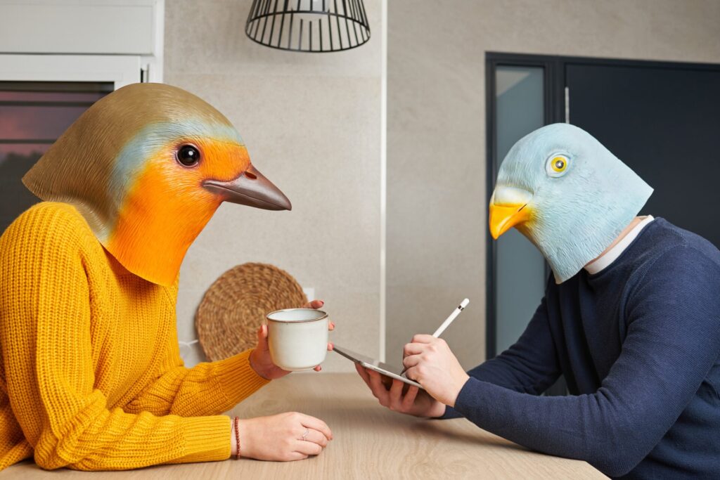 Couple,Disguised,With,Bird,Mask,Make,Family,Life,In,The