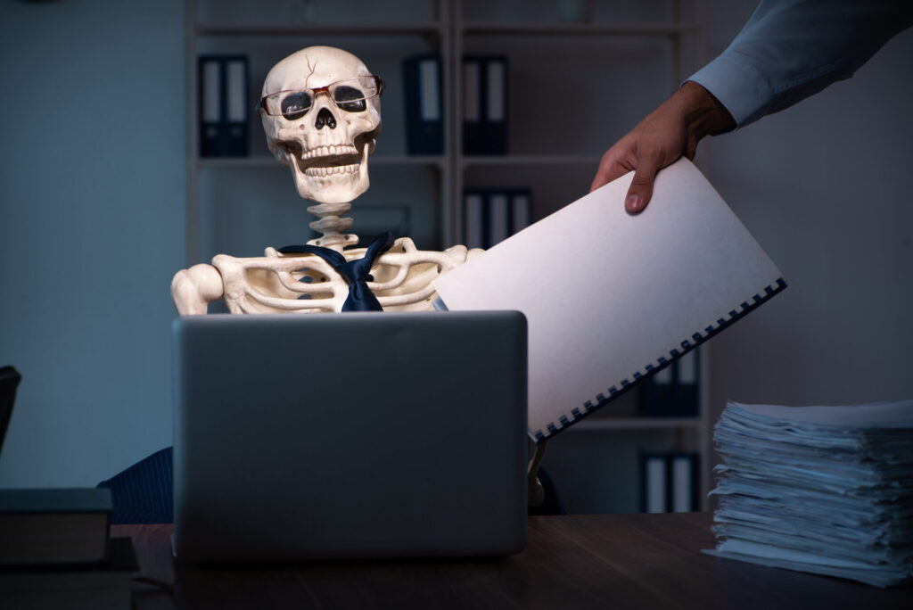 Young,Male,Employee,Working,In,The,Office,Night,Time