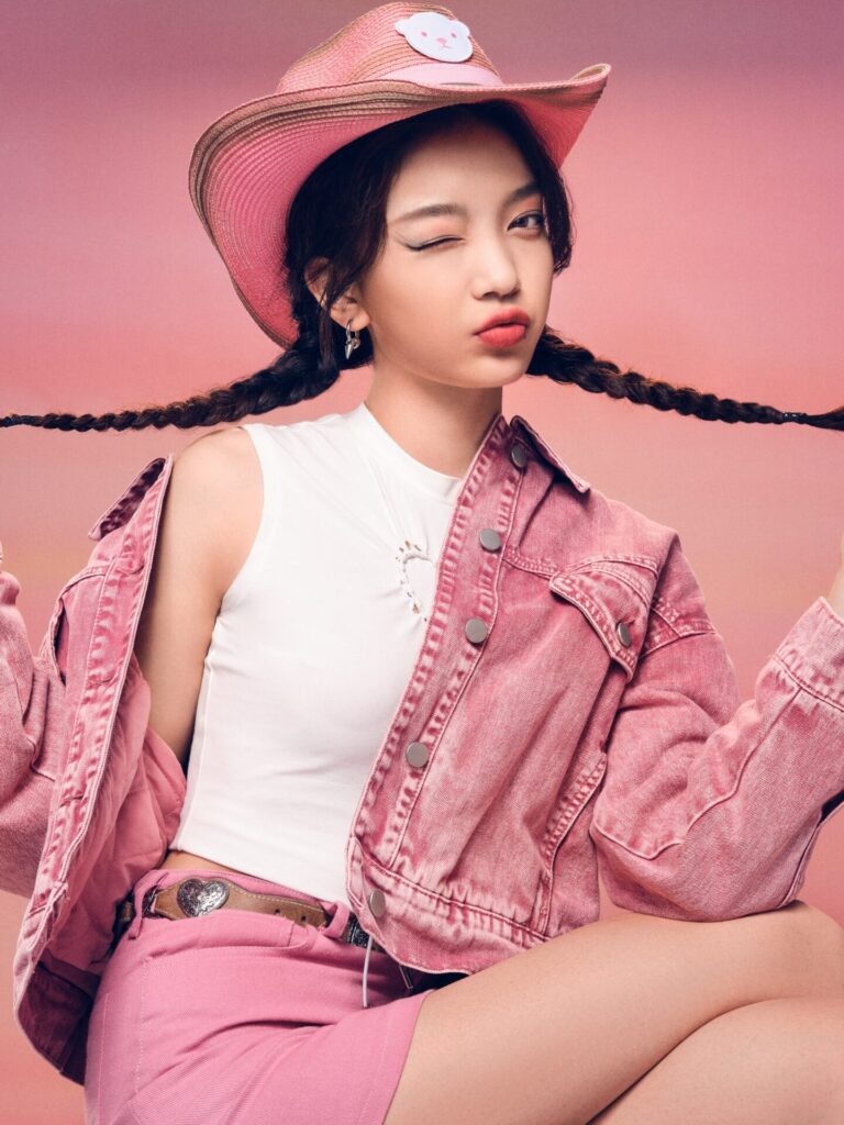 Trendy,Young,Woman,In,Pink,Denim,And,Hat,Striking,A